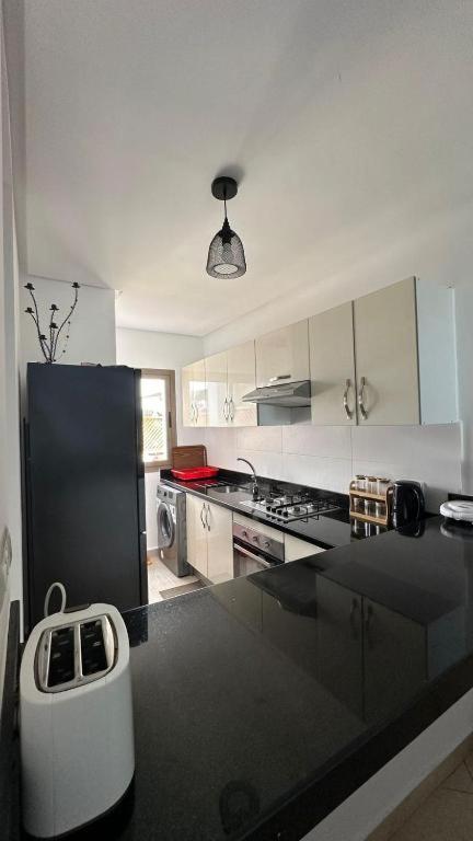 Appartement Pied Dans L Eau A Residence Beralmar 아실라 외부 사진